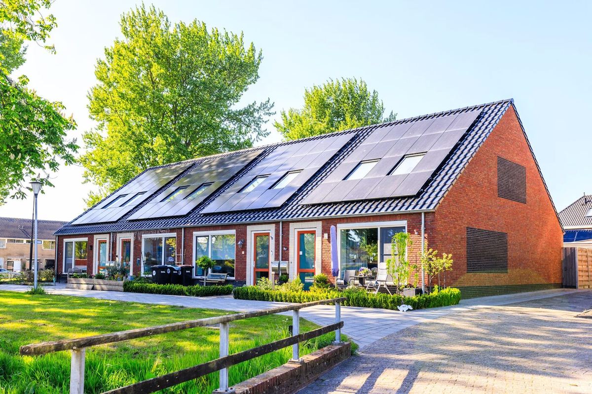 Solar panels laid out around roof skylights and obstructions